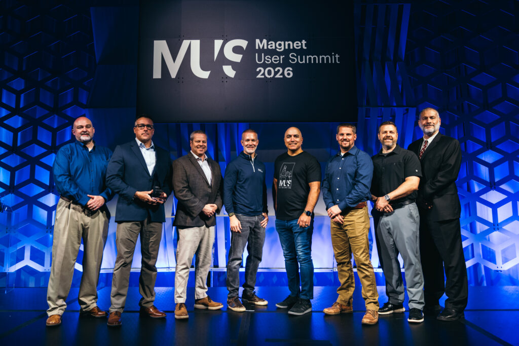 The Rochester Police award recepients on stage at Magnet User Summit 2026 recieving their trophies.